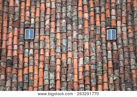 Terracotta Tile Roof With Two Glass Windows