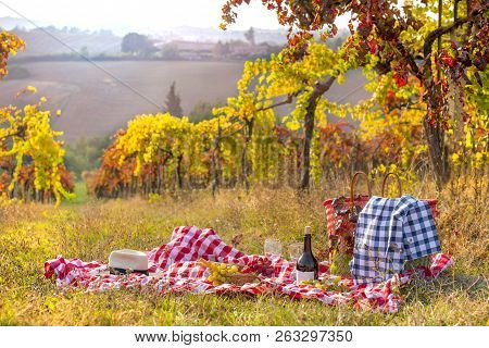 Picnic At Sunset In The Hills Of Italy. Vineyards And Open Nature In The Fall. Romantic Dinner, Frui