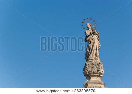 Baroque Statues Of Saints. Detail Of Baroque Plague Column In The Town Of Valtice In Southern Moravi