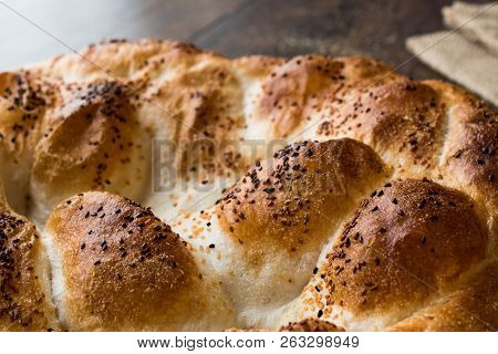 Turkish Ramadan Bread - Ramazan Pidesi On Wooden Surface / Pide
