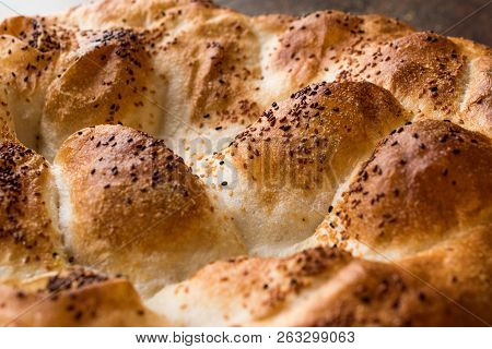 Turkish Ramadan Bread - Ramazan Pidesi On Wooden Surface / Pide