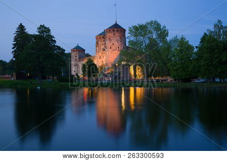 The Ancient Olavinlinna Fortress In July Twilight. Savonlinna, Finland