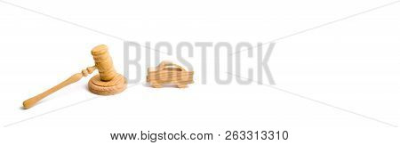 Wooden Figurine Of A Car In The Hammer Of A Judge On A White Background. Minimalism. Purchase And Sa