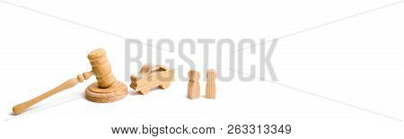 Wooden Figurine Of A Car With People In A Hammer Of The Judge On A White Background. Minimalism. Pur