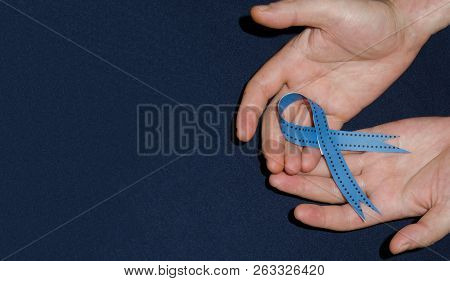 Man Holding A Blue Ribbon, Blue November Concept