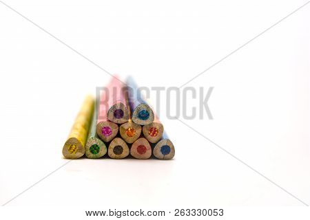 Colorful Pencils Are Not Sharpened And Lie On The Table. These Colors Can Draw Festive Pictures