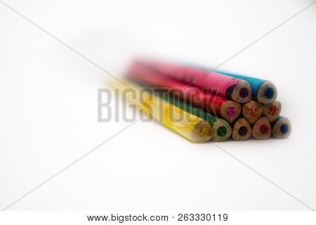 Colorful Pencils Are Not Sharpened And Lie On The Table. These Colors Can Draw Festive Pictures