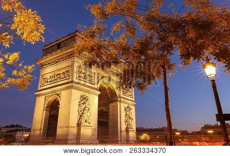 The Triumphal Arch In Evening, Paris, France.