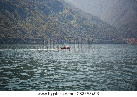 Lake Como, Italy - July 6, 2017: Speed Boat On Lake Como, On A Bright Summer Day.  Lake Como Is The 