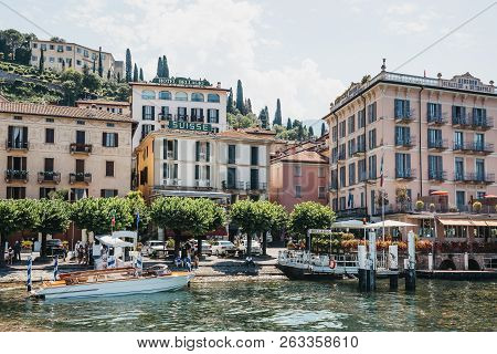 Bellagio, Italy - July 06, 2017: Pier And Colourful Buildings Of Bellagio, View From Lake Como. Bell