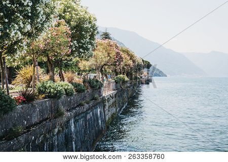 Bellagio, Italy - July 06, 2017: People Walking In The Park In Bellagio, Overlooking Lake Como. Bell