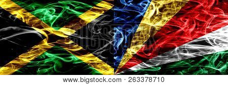 Jamaica Vs Seychelles, Seychelloise Smoke Flags Placed Side By Side. Thick Colored Silky Smoke Flags