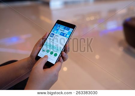 Chiang Mai, Thailand - August 03,2018: Woman Holding Huawei Mobile Phone With Linkedin Application O