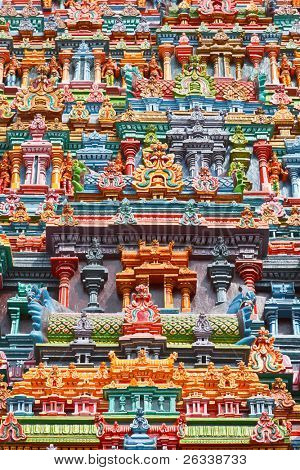 Sculptures on Hindu temple gopura (tower). Menakshi Temple, Madurai, Tamil Nadu, India