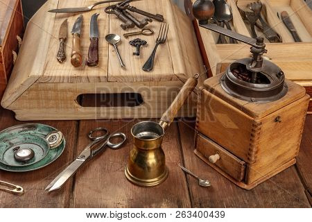 A Photo Of Many Vintage Objects, Flea Market Stuff On A Wooden Table