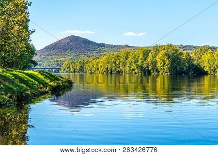 Radobyl Mountain In Ceske Stredohori, Central Bohemian Uplands. View From Labe River In Litomerice, 
