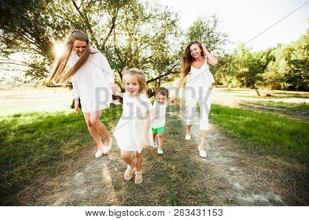 A Large Family With Homosexual Parents. Two Mothers.