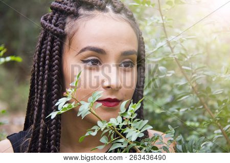 Young Beautiful Girl With Braided Hair