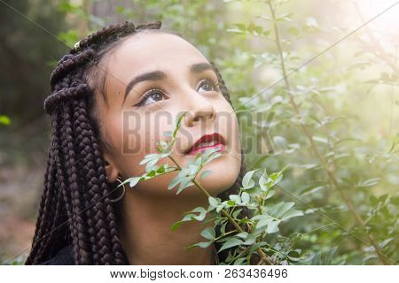 Young Beautiful Girl With Braided Hair