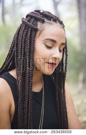 Young Beautiful Girl With Braided Hair