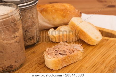 Homemade Rillettes French Meat Spread Made Of Pork On A Baguette Bread Closeup