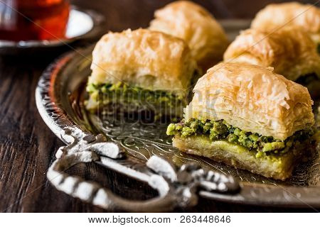 Turkish Dessert Baklava With Tea On Silver Tray.