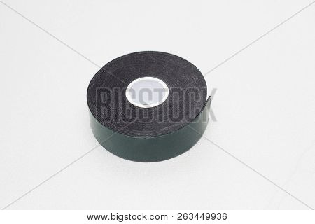 Reel Of Double-sided Tape On A Silver Background, Close-up, Scotch Tape