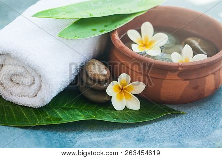 Tropical Flowers, Leaves And Stobes In Composition With Sunlight For Spa Relax Salon