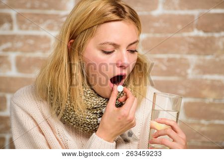 Woman Tousled Hair Scarf Hold Glass Water And Tablets Blister. Girl Feels Ill Suffer Fever And Take 