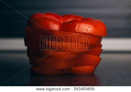 Slised Sweet Bell Red Pepper On Blurry Background