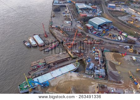 Royal Victoria Dock, London, Uk - February 14, 2018: Aerial View From The Cable Car Of Industrial Ar