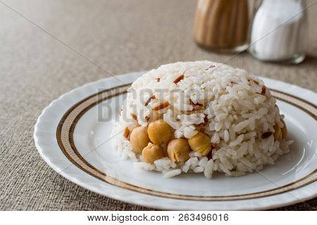 Turkish Rice With Chickpea Served With Salt And Pepper / Nohut Pilav.