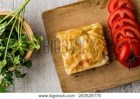 Su Boregi / Turkish Patty With Tomatoes.