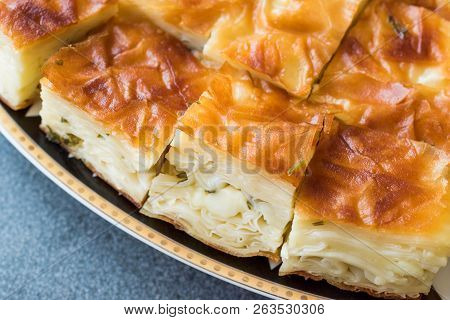 Su Boregi / Turkish Patty Borek Slices Served With Plate / Burek