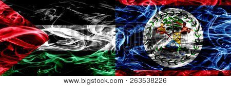 Palestine Vs Belize, Belizean Smoke Flags Placed Side By Side. Thick Colored Silky Smoke Flags Of Pa