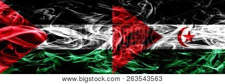 Palestine Vs Sahrawi Smoke Flags Placed Side By Side. Thick Colored Silky Smoke Flags Of Palestinian