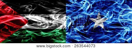 Palestine Vs Somalia, Somalian Smoke Flags Placed Side By Side. Thick Colored Silky Smoke Flags Of P