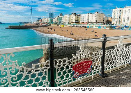 Beautiful View Of Brighton Pier With Brighton Beach Sea, Sand And British Airways I360 In The Backgr