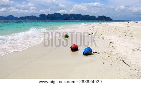 Colored Coconuts On The Beach, Poda Island, Koh Poda, Krabi, Thailand