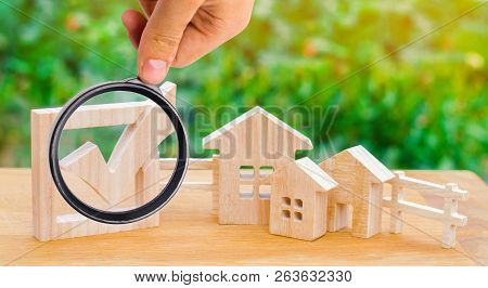 Wooden Houses And Checkbox. The Concept Of Elections In The Municipality. Law On Real Estate. Local 