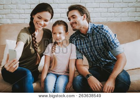 Family Makes Selfie. Smiling Little Girl. Smiling Family At Home. Smiling Person. Family With Child.