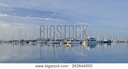Beautiful Sunset With Yachts Over The Bay