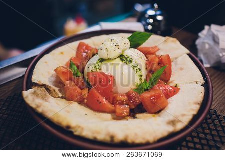 Turkish And Arabic Traditional Ramadan Pide With Egg On Top. Wood Background. Pizza Margherita Is A 