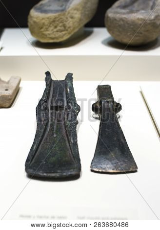 Madrid, Spain - November 11, 2017: Half Mould And Palstave Of Late Bronce Age Axe. Selective Focus A