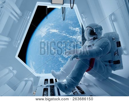 Astronaut sitting inside .