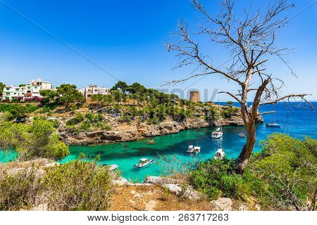 Mediterranean Sea Spain, Beautiful Bay With Boats At Cala Pi, Idyllic Seaside On Mallorca Island