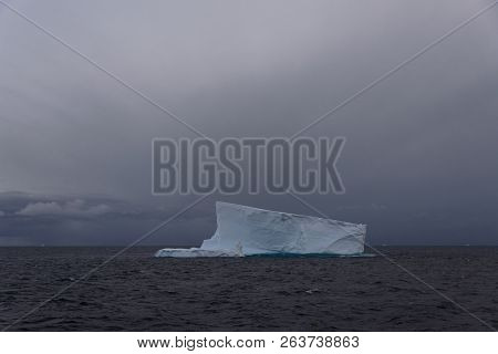 Antarctic Seascape Tabular  With Iceberg