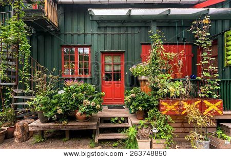 Copenhagen, Denmark - Sept 7: Flowers And Plant Of Traditional Village House Of Christiania Freetown