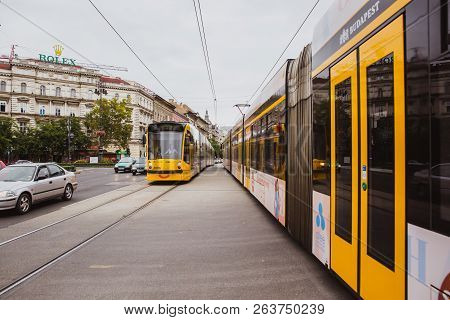 Budapest, Hungary - September 29, 2018: Yellow Trams With A Smile On Andrassy Street In The Central 