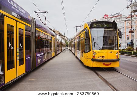 Budapest, Hungary - September 29, 2018: Yellow Trams With A Smile On Andrassy Street In The Central 